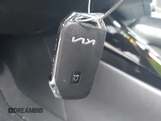 2022 Kia Forte GT-Line z VIN 3KPF54AD0NE490720, wystawiony jako IAAI lot #42168294 z przebiegiem 25 875 mil mil oraz . Historia ofert i sprzedaży dostępna na DreamBid. Obrazek 11.