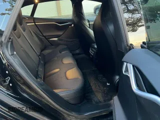 2017 Tesla Model S 60 with VIN 5YJSA1E15HF219286, listed as a Copart auction lot 57360515 with 44,520 mi miles and Salvage title. Bid and sale history available at DreamBid. Image 6.