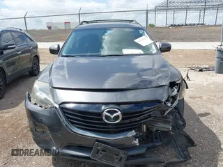 2015 Mazda CX-9 Touring with VIN JM3TB2CA7F0460232, listed as a IAAI auction lot 42344122 with 103,478 mi miles and . Bid and sale history available at DreamBid. Image 13.