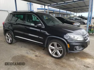 2015 Volkswagen Tiguan R-Line with VIN WVGAV7AX3FW064500, listed as a Copart auction lot 54745215 with 103,406 mi miles and Salvage Title. Bid and sale history available at DreamBid. Image 4.