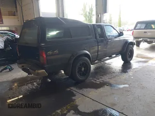 1999 Nissan Frontier XE with VIN 1N6ED26Y9XC343446, listed as a IAAI auction lot 41609051 with 181,115 mi miles and . Bid and sale history available at DreamBid. Image 4.