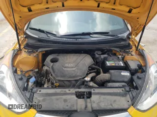 2016 Hyundai Veloster z VIN KMHTC6AD8GU278670, wystawiony jako Copart lot #57315695 z przebiegiem 89 496 mil mil oraz Szkoda całkowita • Salvage title. Historia ofert i sprzedaży dostępna na DreamBid. Obrazek 11.