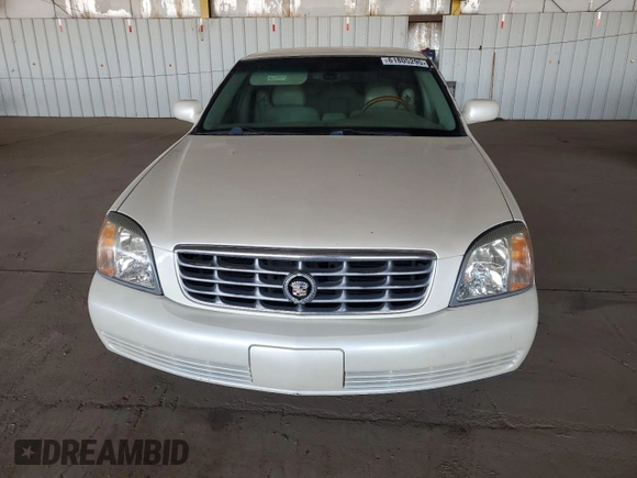 2001 Cadillac DeVille DHS z VIN 1G6KE57Y41U150631, wystawiony jako Copart lot #61805295 z przebiegiem 96 158 mil mil oraz Czysty tytuł • Clean title. Historia ofert i sprzedaży dostępna na DreamBid. Obrazek 5.