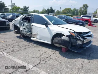 2019 Toyota Camry LE z VIN 4T1B11HK9KU204904, wystawiony jako IAAI lot #42391631 z przebiegiem 130 088 mil mil oraz . Historia ofert i sprzedaży dostępna na DreamBid. Obrazek 1.