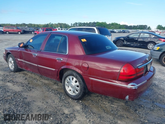 2004 Mercury Grand Marquis LS Premium z VIN 2MEFM75WX4X671041, wystawiony jako IAAI lot #42261517 z przebiegiem 107 182 mil mil oraz . Historia ofert i sprzedaży dostępna na DreamBid. Obrazek 3.