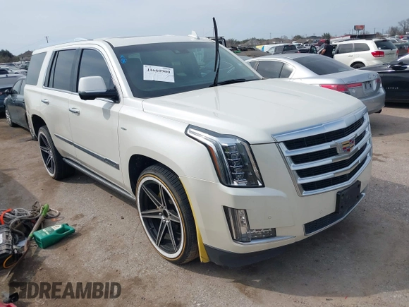 2015 Cadillac Escalade Premium z VIN 1GYS3NKJ1FR553712, wystawiony jako IAAI lot #41660900 z przebiegiem 93 423 mil mil oraz . Historia ofert i sprzedaży dostępna na DreamBid. Obrazek 1.