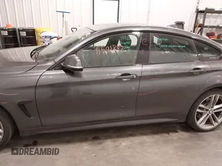 2018 BMW 4 Series 430i xDrive with VIN WBA4J3C52JBG95207, listed as a IAAI auction lot 41509392 with 68,193 mi miles and . Bid and sale history available at DreamBid. Image 14.