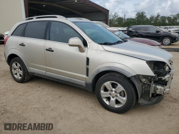 2014 Chevrolet Captiva Sport LS with VIN 3GNAL2EK7ES650422, listed as a Copart auction lot 72903474 with 102,543 mi miles and Salvage Title. Bid and sale history available at DreamBid. Image 4.