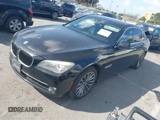2012 BMW 7 Series 740i with VIN WBAKA4C5XCDS99253, listed as a IAAI auction lot 41710171 with 176,907 mi miles. Bid and sale history available at carsss.com. Image 2.