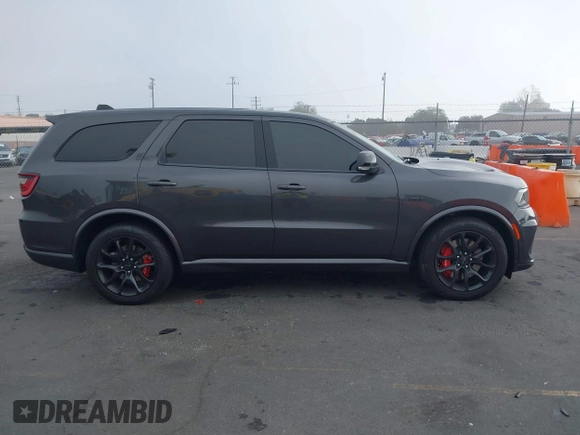 2023 Dodge Durango SRT 392 Premium z VIN 1C4SDJGJ2PC692935, wystawiony jako IAAI lot #41029734 z przebiegiem 7 191 mil mil oraz . Historia ofert i sprzedaży dostępna na DreamBid. Obrazek 13.