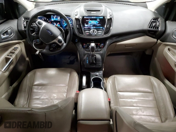 2014 Ford Escape Titanium with VIN 1FMCU9JX1EUD40870, listed as a Copart auction lot 51337695 with 163,210 mi miles and Salvage Title. Bid and sale history available at DreamBid. Image 8.