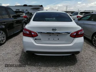 2017 Nissan Altima SV with VIN 1N4AL3AP0HC288742, listed as a IAAI auction lot 42560397 with 206,089 mi miles and . Bid and sale history available at DreamBid. Image 16.