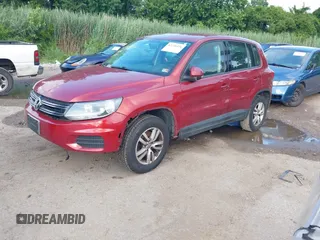 2012 Volkswagen Tiguan SE with VIN WVGAV7AX6CW090956, listed as a IAAI auction lot 42716526 with 227,665 mi miles and . Bid and sale history available at DreamBid. Image 2.