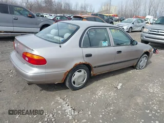 1999 Chevrolet Prizm z VIN 1Y1SK5488XZ446950, wystawiony jako IAAI lot #41798129 z przebiegiem 292 798 mil mil oraz . Historia ofert i sprzedaży dostępna na DreamBid. Obrazek 4.