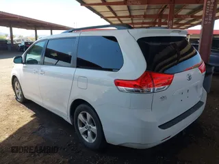 2012 Toyota Sienna LE AAS with VIN 5TDKK3DC4CS274117, listed as a IAAI auction lot 42008690 with 205,353 mi miles. Bid and sale history available at carsss.com. Image 3.
