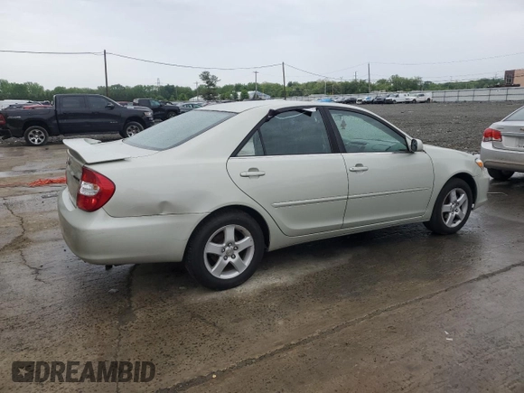 2004 Toyota Camry LE z VIN JTDBE32K940297754, wystawiony jako Copart lot #55809155 z przebiegiem 232 092 mil mil oraz Szkoda całkowita • Salvage title. Historia ofert i sprzedaży dostępna na DreamBid. Obrazek 3.