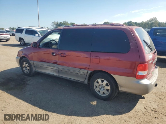2003 Kia Sedona LX with VIN KNDUP131236411909, listed as a Copart auction lot 73715384 with 179,642 mi miles and Salvage Title. Bid and sale history available at carsss.com. Image 2.