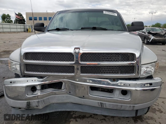 1999 Dodge 2500 z VIN 1B7KF2361XJ509781, wystawiony jako Copart lot #57282495 z przebiegiem 135 666 mil mil oraz Szkoda całkowita • Salvage title. Historia ofert i sprzedaży dostępna na DreamBid. Obrazek 5.