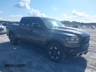 2021 Ram 1500 Rebel with VIN 1C6SRFLT9MN634673, listed as a IAAI auction lot 40227246 with 39,061 mi miles and . Bid and sale history available at DreamBid. Image 1.