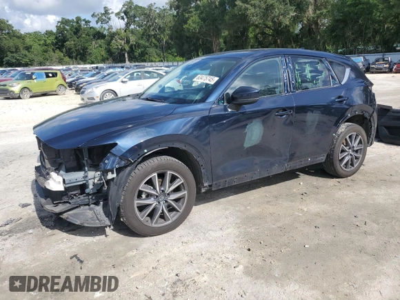 2018 Mazda CX-5 Grand Touring with VIN JM3KFBDMXJ0350499, listed as a Copart auction lot 63475745 with 119,642 mi miles and Salvage title. Bid and sale history available at DreamBid. Image 1.