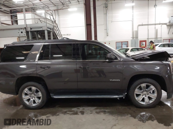 2016 GMC Yukon SLT z VIN 1GKS2BKC2GR320923, wystawiony jako IAAI lot #42196868 z przebiegiem 134 754 mil mil oraz . Historia ofert i sprzedaży dostępna na DreamBid. Obrazek 13.