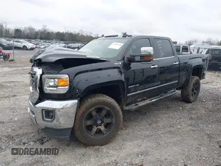 2018 GMC Sierra 2500HD SLT with VIN 1GT12TEY9JF279932, listed as a IAAI auction lot 41583208 with 70,465 mi miles. Bid and sale history available at carsss.com. Image 2.