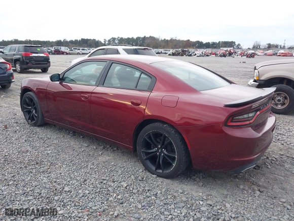 2017 Dodge Charger SE with VIN 2C3CDXBGXHH612156, listed as a IAAI auction lot 41028308 with 123,438 mi miles. Bid and sale history available at carsss.com. Image 3.