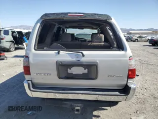 1999 Toyota 4Runner SR5 with VIN JT3GN86R4X0099618, listed as a Copart auction lot 58204145 with 297,759 mi miles and Salvage title. Bid and sale history available at DreamBid. Image 6.