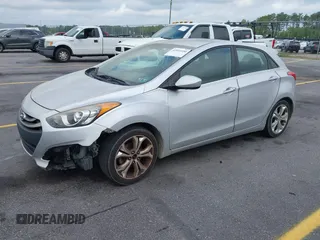2013 Hyundai Elantra GT with VIN KMHD35LE7DU131627, listed as a IAAI auction lot 42093450 with 147,183 mi miles. Bid and sale history available at carsss.com. Image 2.