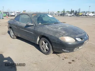 2000 Ford Escort ZX2 with VIN 3FAKP113XYR255310, listed as a IAAI auction lot 42078201 with 236,443 mi miles. Bid and sale history available at carsss.com. Image 1.