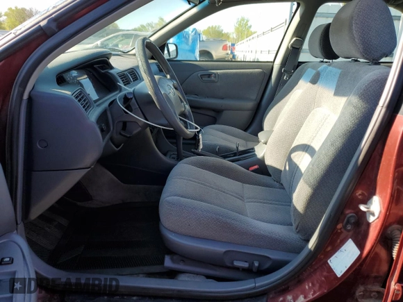2000 Toyota Camry CE z VIN 4T1BG22K2YU938855, wystawiony jako Copart lot #56047305 z przebiegiem 129 096 mil mil oraz Szkoda całkowita • Salvage title. Historia ofert i sprzedaży dostępna na DreamBid. Obrazek 7.