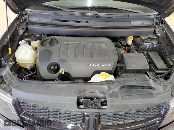 2014 Dodge Journey Crossroad with VIN 3C4PDCGG8ET284320, listed as a Copart auction lot 46924985 with 192,321 mi miles and Salvage title. Bid and sale history available at DreamBid. Image 13.