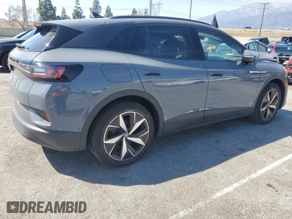 2023 Volkswagen ID.4 Pro with VIN 1V2VMPE86PC042164, listed as a Copart auction lot 50260215 with 4,328 mi miles and Clean Title. Bid and sale history available at DreamBid. Image 3.