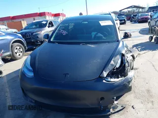 2020 Tesla Model 3 Standard Range Plus with VIN 5YJ3E1EA4LF745491, listed as a IAAI auction lot 41186726 with 74,575 mi miles and . Bid and sale history available at DreamBid. Image 12.