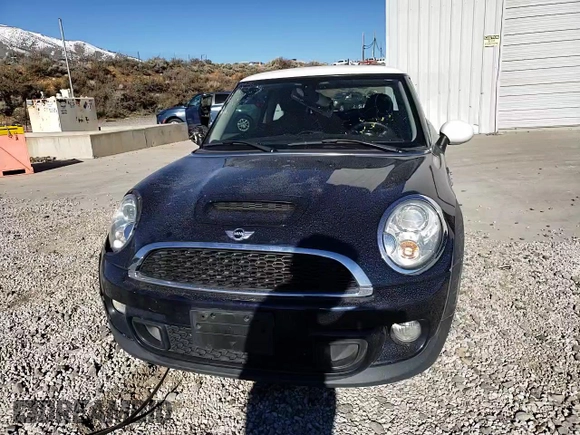 2013 MINI Hardtop S with VIN WMWSV3C52DT393181, listed as a Copart auction lot 50179065 with 66,655 mi miles and Salvage Title. Bid and sale history available at DreamBid. Image 11.