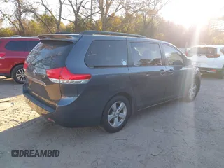 2011 Toyota Sienna LE AAS with VIN 5TDKK3DC2BS070656, listed as a IAAI auction lot 41034261 with 259,239 mi miles. Bid and sale history available at carsss.com. Image 4.