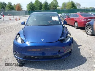 2023 Tesla Model Y Long Range with VIN 7SAYGDEE7PF702051, listed as a IAAI auction lot 42074182 with 50,473 mi miles and . Bid and sale history available at DreamBid. Image 11.