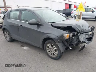 2016 Chevrolet Sonic LT with VIN 1G1JC6SB6G4145245, listed as a IAAI auction lot 41353744 with 103,371 mi miles and . Bid and sale history available at DreamBid. Image 1.