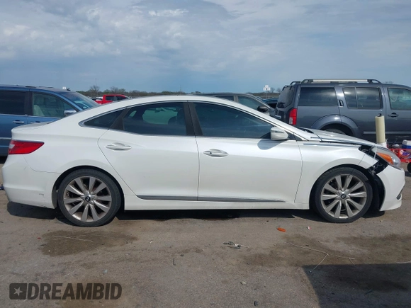 2015 Hyundai Azera Limited with VIN KMHFH4JG7FA476458, listed as a IAAI auction lot 41893979 with 149,114 mi miles and . Bid and sale history available at DreamBid. Image 13.
