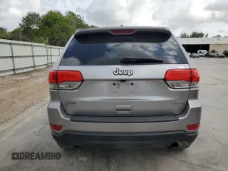 2017 Jeep Grand Cherokee Laredo with VIN 1C4RJEAG0HC664063, listed as a Copart auction lot 54850295 with 82,913 mi miles and Salvage title. Bid and sale history available at DreamBid. Image 6.