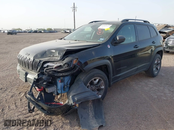 2019 Jeep Cherokee Trailhawk Elite with VIN 1C4PJMBX4KD385796, listed as a IAAI auction lot 41557577 with 55,700 mi miles. Bid and sale history available at carsss.com. Image 2.