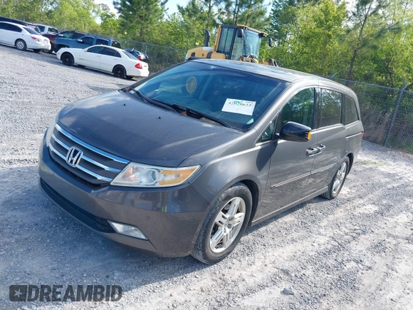 2012 Honda Odyssey Touring с VIN 5FNRL5H93CB133288, выставлен на аукционе IAAI как лот 42020622 с пробегом 184 077 миль миль и . История ставок и продаж доступна на DreamBid. Изображение 2.