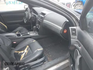 2009 Pontiac G8 z VIN 6G2ER57789L169343, wystawiony jako IAAI lot #42391701 z przebiegiem 293 400 mil mil oraz . Historia ofert i sprzedaży dostępna na DreamBid. Obrazek 5.