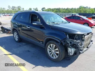 2011 Kia Sorento EX with VIN 5XYKUDA27BG053442, listed as a IAAI auction lot 42062265 with 120,996 mi miles. Bid and sale history available at carsss.com. Image 1.