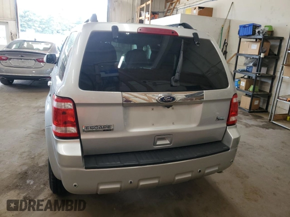2010 Ford Escape Limited with VIN 1FMCU9EGXAKB93593, listed as a Copart auction lot 62239655 with 131,746 mi miles and Salvage title. Bid and sale history available at DreamBid. Image 6.
