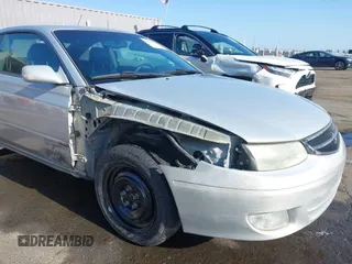 2001 Toyota Solara SE z VIN 2T1CF28P91C491927, wystawiony jako IAAI lot #42475651 z przebiegiem 142 628 mil mil oraz . Historia ofert i sprzedaży dostępna na DreamBid. Obrazek 6.