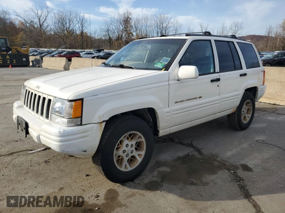 1997 Jeep Grand Cherokee Limited with VIN 1J4GZ78Y0VC727386, listed as a Copart auction lot 78673094 with 199,729 mi miles and Clean Title. Bid and sale history available at carsss.com. Image 1.