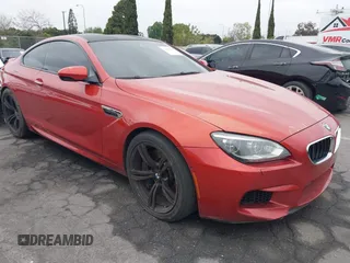 2013 BMW M6 z VIN WBSLX9C55DC968497, wystawiony jako IAAI lot #41863884 z przebiegiem 128 241 mil mil oraz . Historia ofert i sprzedaży dostępna na DreamBid. Obrazek 14.