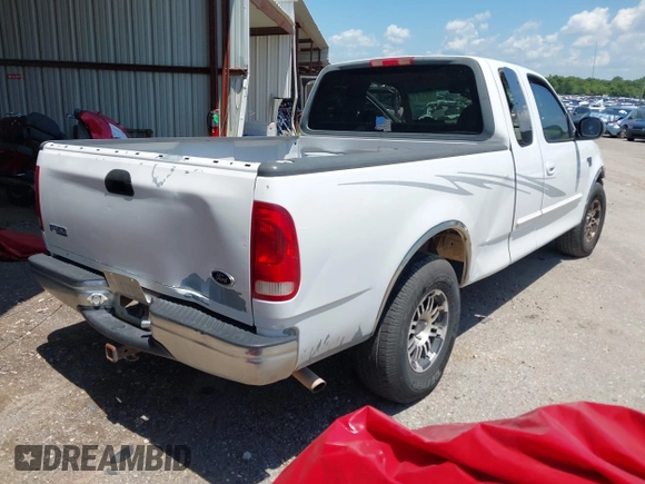 2000 Ford F-150 XL z VIN 1FTRX17L7YKA82690, wystawiony jako IAAI lot #42597325 z przebiegiem Nie podano mil oraz . Historia ofert i sprzedaży dostępna na DreamBid. Obrazek 4.