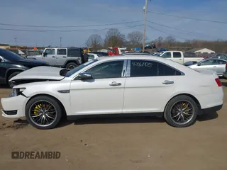 2015 Ford Taurus SEL z VIN 1FAHP2E86FG202386, wystawiony jako IAAI lot #42061925 z przebiegiem 123 475 mil mil oraz . Historia ofert i sprzedaży dostępna na DreamBid. Obrazek 15.